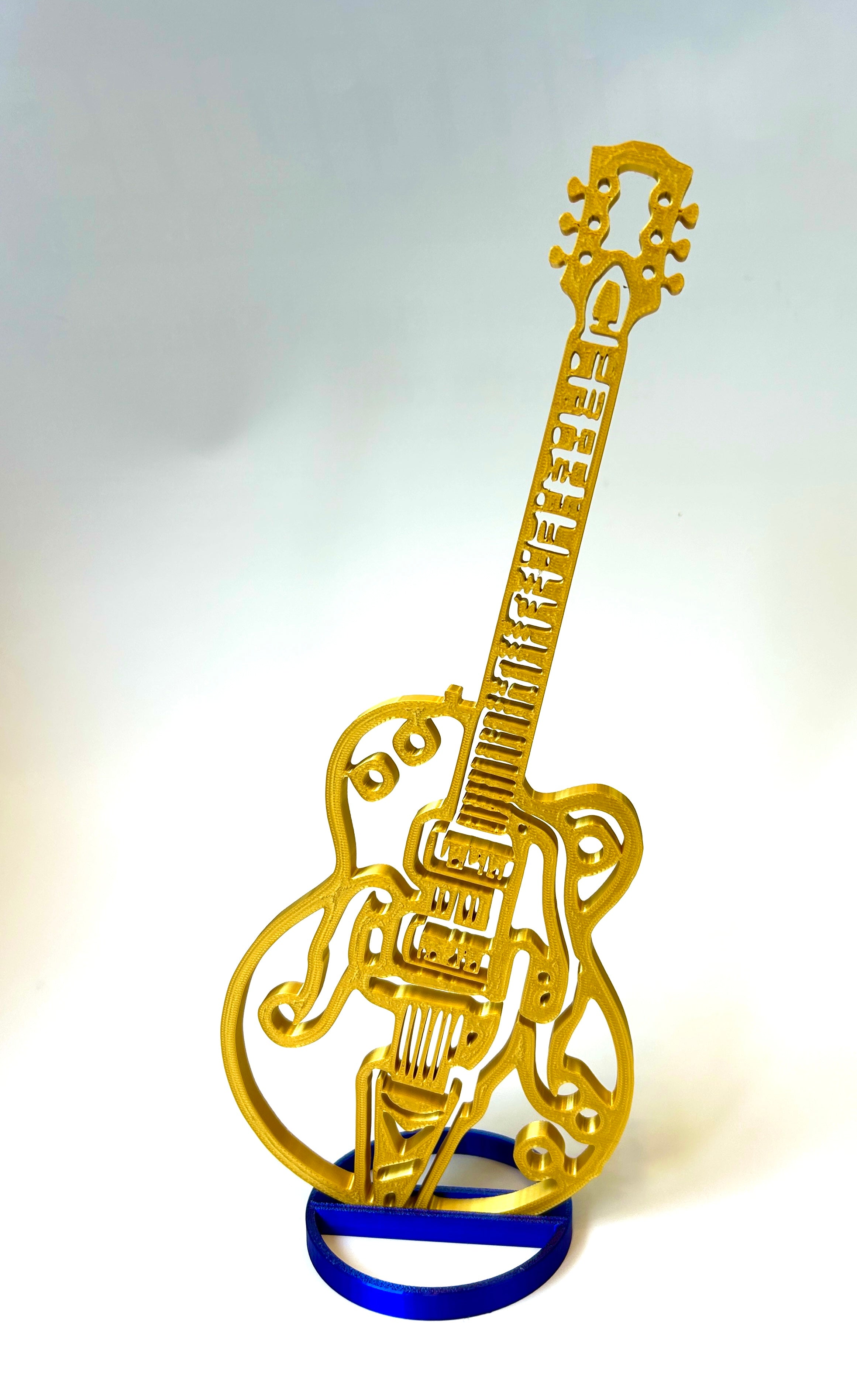Gold band instrument banquet table centerpieces guitar