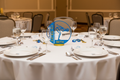 Girl swimmer award on banquet table