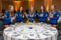 Gold volleyball centerpiece with celebrating volleyball players