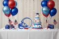 Graduation party cake table with blue and red football helmet