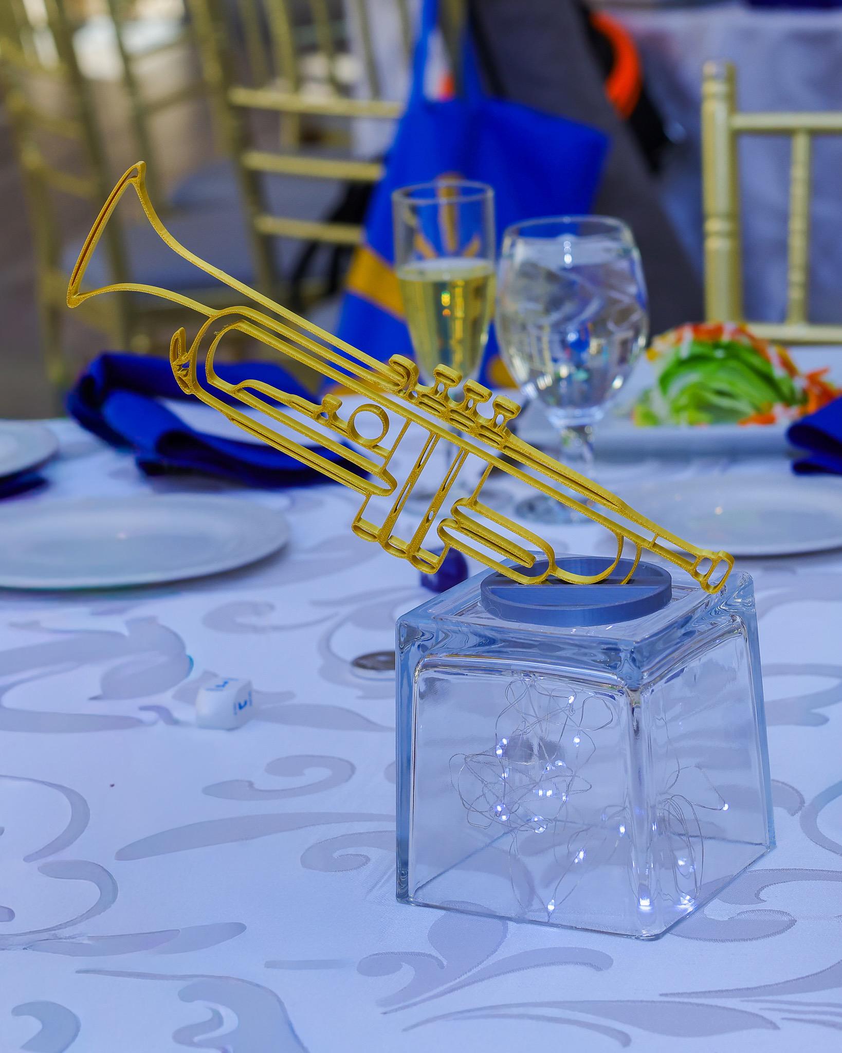 Gold band instrument banquet table centerpieces