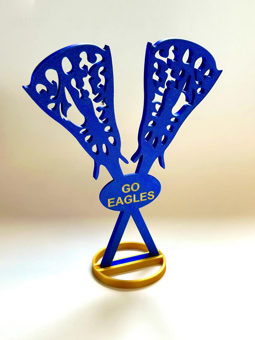 Personalized lacrosse sticks on banquet table 