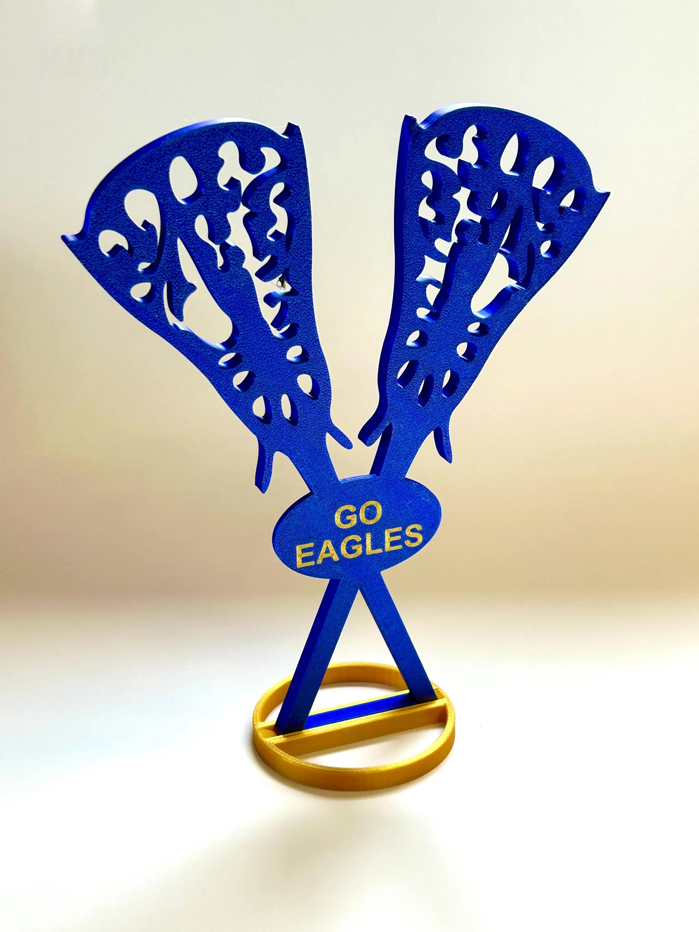 Personalized lacrosse sticks on banquet table 
