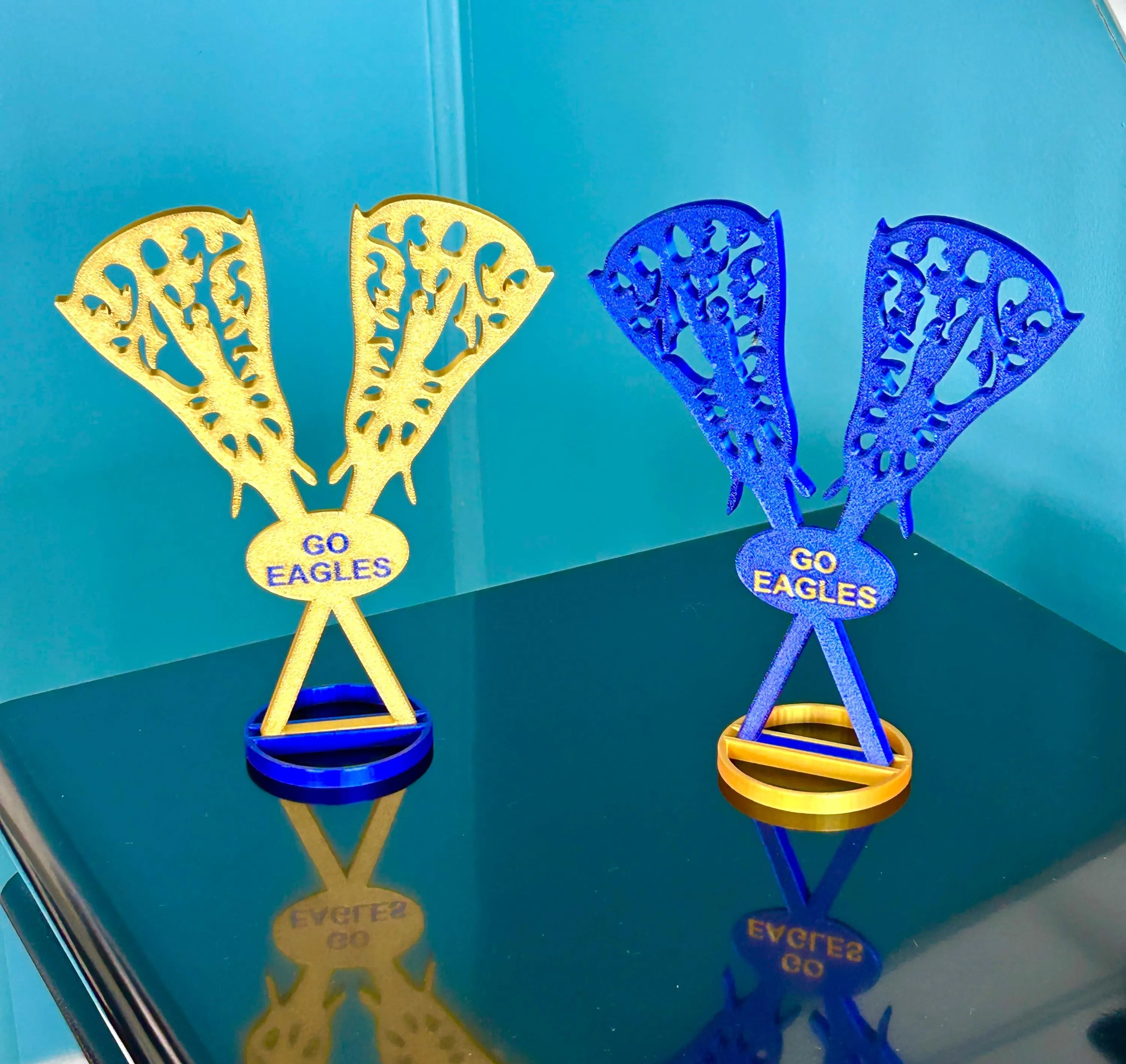 Personalized lacrosse sticks on banquet table 